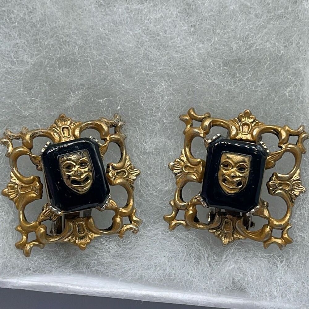 Vintage mask ornate clip earrings.